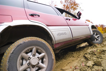 Fototapeta na wymiar Jeep on mud road