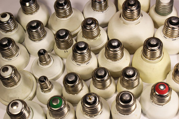 Screw bases of fluorescent energy saving lamps
