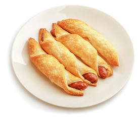 Sausage rolls isolated on white background.