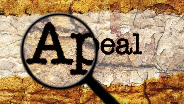 Magnifying glass on appeal text