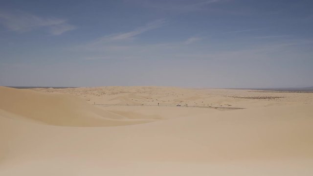 Desert Sand Dune Highway / Multiple clips of a highway in the desert.