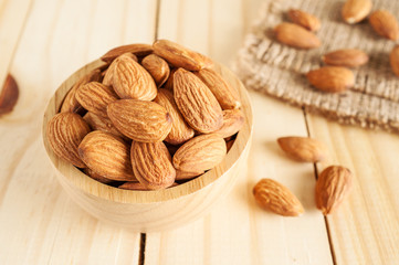 Almond snack fruit in wooden bowl