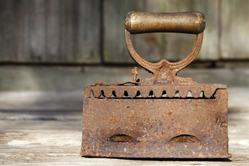 Old vintage iron on coals