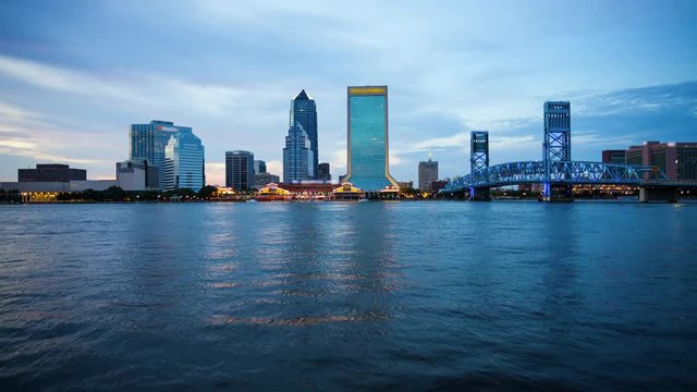 Day to Night Timelapse of Jacksonville, Florida city skyline over the St. John's River (logos blurred for commercial use)