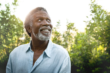 Portrait of mature man outdoors smiling