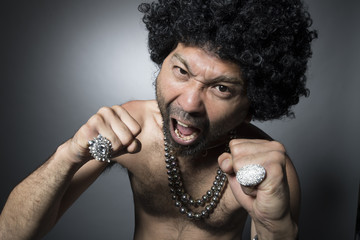 Man of Afro hair has a fighting pose
