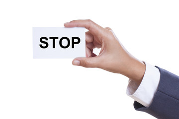 Businessman showing stop sign on white background 