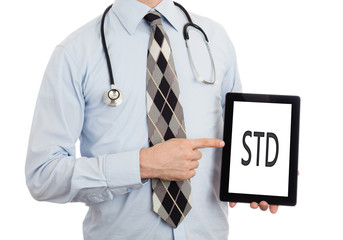 Doctor holding tablet - STD