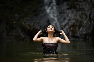 Fototapeta premium Girls swimming in the river.