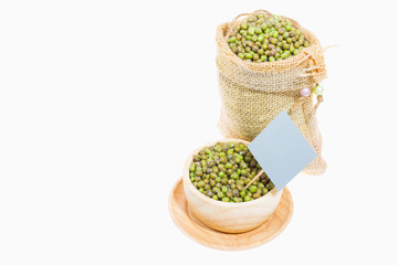 Green beans in a sack and bowl ,On white background.