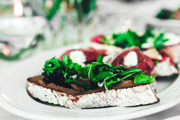 delicious sandwich of toasted bread, meat and spinach