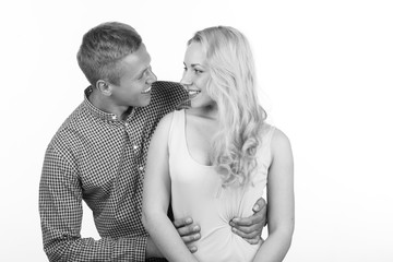 young couple in love on a white background , black and white concept