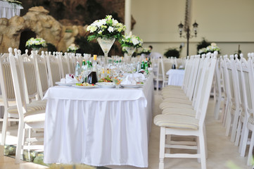 Stylish table set for wedding dinner
