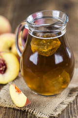 Peach ice tea (selective focus)