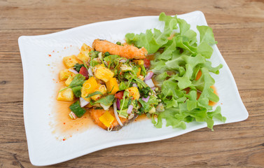 Salmon fish sauce dressing, vegetables, fruit.