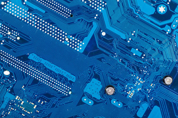 blue circuit board background of computer motherboard