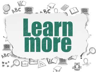 Education concept: Learn More on Torn Paper background