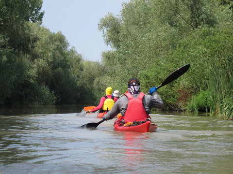 Traveler paddling in kayak. Kayaking in Vilkovo. Ukraine