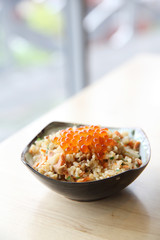 Japanese Cuisine Fried Rice with salmon and caviar on top