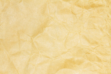 Recycled crumpled brown paper texture or paper background for design with copy space for text or image.