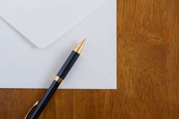 Envelope and pen