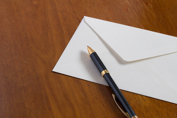 Envelope and pen