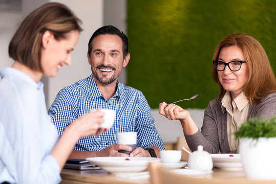 Smiling Colleagues Having A Lunch