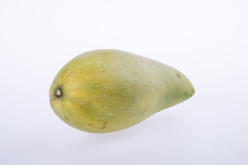 mangos or green yellow mangos on background.