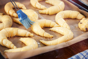 Young Couple Baking Yeast Cake
