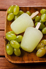 Ice lolly of green grapes