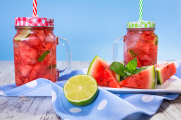 Watermelon and lime lemonades on kitchen table