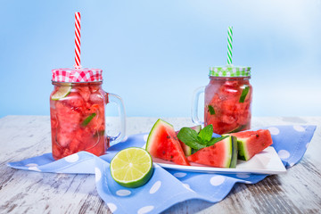 Watermelon and lime lemonades on kitchen table
