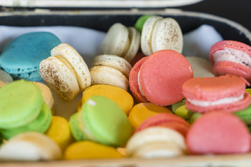 Close-up of colourful macarons in a box