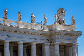 Obraz premium Fragment of colonnade of St. Peter's Basilica in Vatican City.