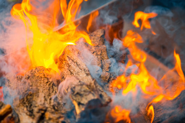 Beautiful burning fire flame background with smoke