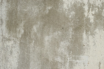 Wall fragment with scratches and cracks
