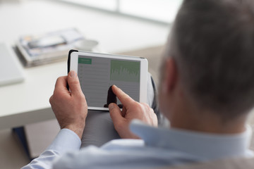 Man using a digital tablet