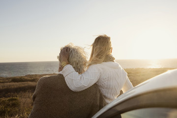 Senior couple looking at sea