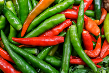 Red and green Fresh chilli peppers with top view