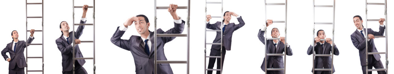 Businessman climbing the ladder isolated on white © Elnur