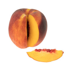 Nectarine with a slice on a white background.