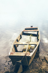 Old fishing boat on riverbank