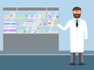 Pharmacist standing near shelves with medications