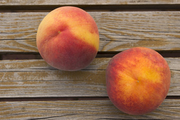 peaches on a wooden background