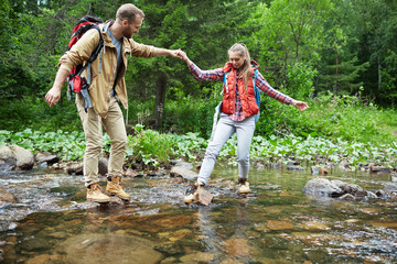Helping to cross river