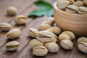 Pistachios on wooden table