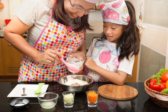 Asian mother and daughter enjoy making Sandwich, Sandwich making