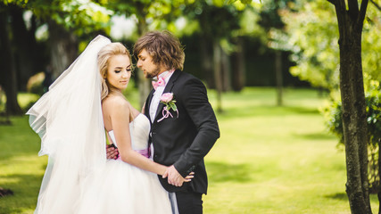 Bride and groom posing together
