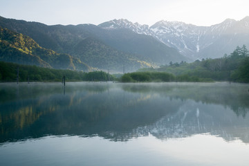 Early morning at spring Kamikochi Taisho-ike pond,nagano,japan