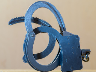Handcuffs,and money.The concept of crime and punishment.
